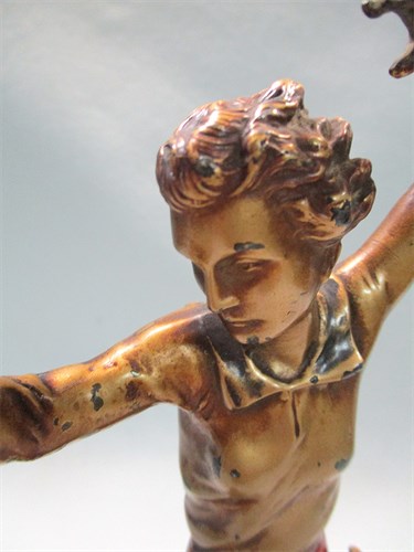 Lot 4 - An Art Deco cold painted figure of a female...