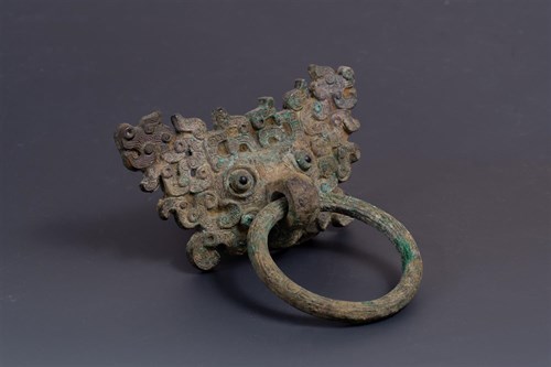 Lot 1 - A Bronze Taotie loose ring handle, Spring and Autumn period