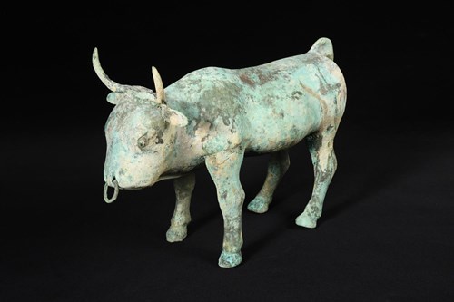 Lot 9 - A Han dynasty bronze model of a buffalo