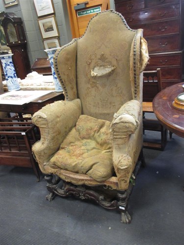 Lot 356 - A pair of William and Mary style wing back...