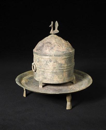 Lot 16 - A bronze ritual cylindrical tripod wine container, cover and tray, Wen Jiu Zun and Pan, late eastern Han dynasty, 3rd century BC