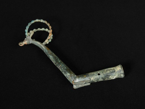 Lot 24 - A Luristan bronze whetstone handle, circa 900-700 BC