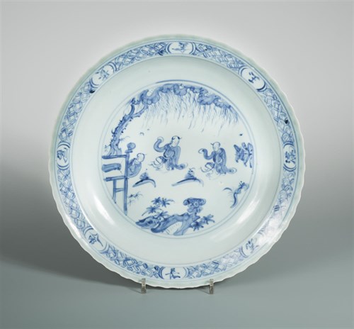 Lot 54 - A Ming dynasty celadon charger