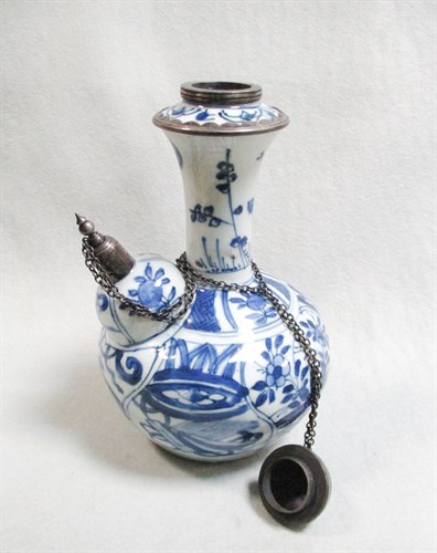 Lot 56 - A Ming dynasty Kendi with silver mounts