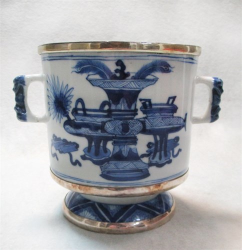 Lot 152 - A Kangxi blue and white silver mounted two handled cylindrical jar