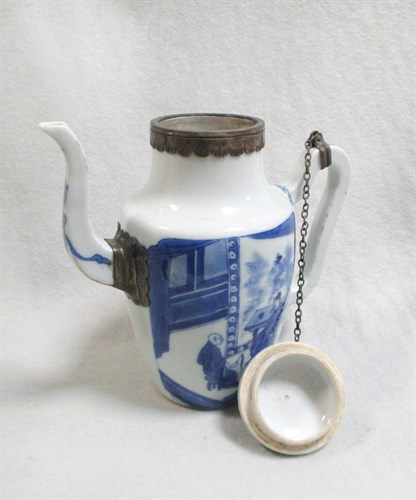 Lot 157 - A Kangxi covered ewer with silver mounts