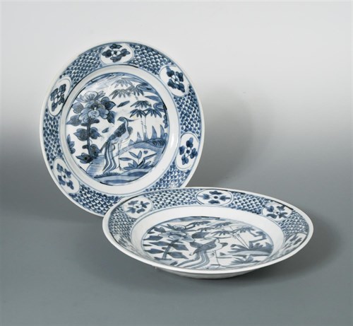 Lot 110 - A pair of late 16th century blue and white Swatow dishes