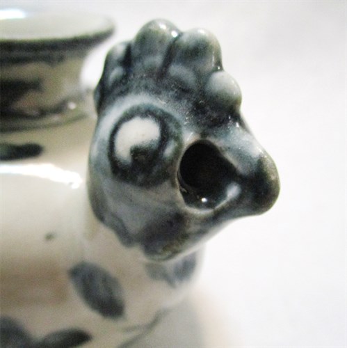 Lot 75 - A provincial Ming chicken head water dropper