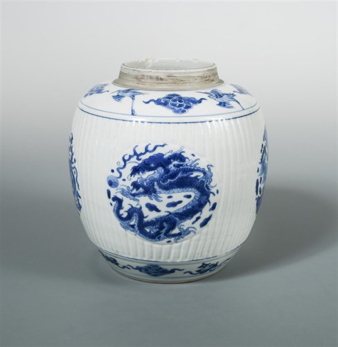 Lot 183 - A Kangxi ribbed spherical jar
