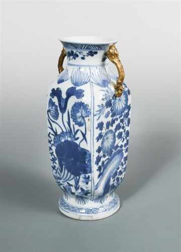 Lot 135 - A transitional square section vase