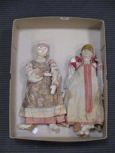 Lot 137 - Two Russian fabric dolls in traditional...