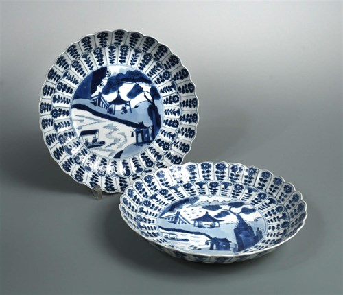 Lot 195 - A pair of Kangxi fluted dishes