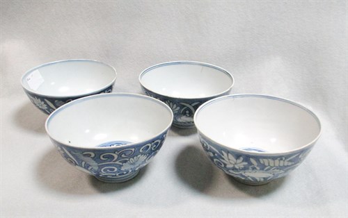 Lot 119 - A set of four provincial  Ming dynasty bowls