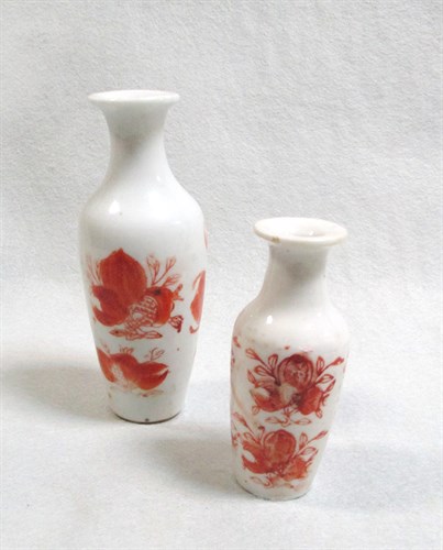 Lot 258 - Two 19th century iron red small vases,...