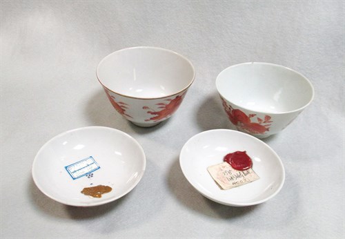 Lot 255 - Three late 19th century iron red tea bowls with cover