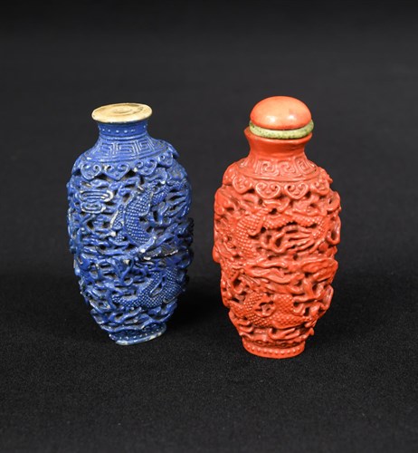 Lot 252 - Two late Qing, early Republic imitation lacquer snuff bottles and a coral topped stopper