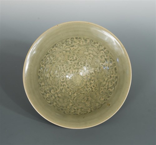 Lot 48 - A Northern Song-Jin dynasty Yaozhou celadon moulded conical bowl