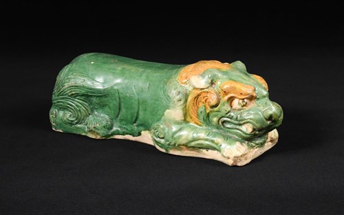 Lot 47 - A sancai-glazed lion-form pottery pillow, Liao dynasty