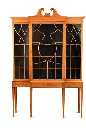 Lot 413 - A late 19th century satinwood and inlaid breakfront display cabinet