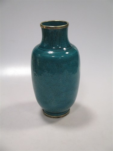 Lot 216 - An Asian turquoise glazed vase with foliate...