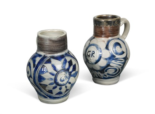 Lot 29 - Two 18th century Westerwald commemorative salt glaze jugs