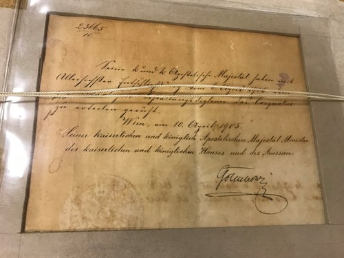 Lot 181 - A framed royal warrant signed by HM King...