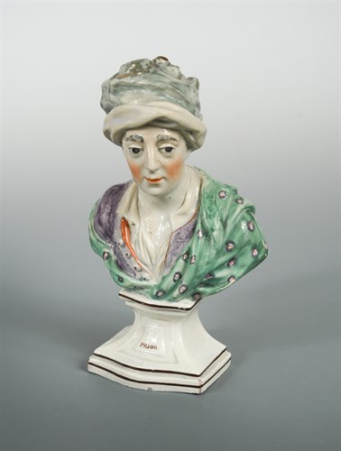 Lot 12 - An early 19th century Staffordshire pearlware bust of Matthew Prior