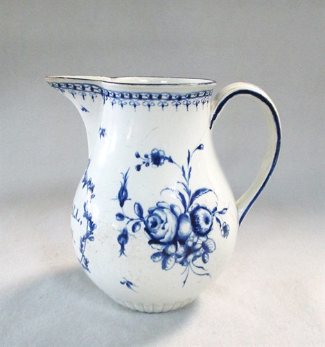 Lot 23 - An 18th century English porcelain blue and white jug