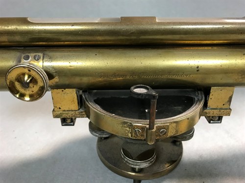 Lot 110 - A lacquered brass surveying level by Troughton...