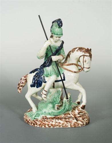 Lot 5 - A Staffordshire creamware group of St George and the Dragon, possibly modelled by Enoch and Ralph Wood, c.1785