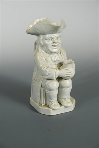 Lot 4 - A late 18th century pearlware Ralph Wood type toby jug