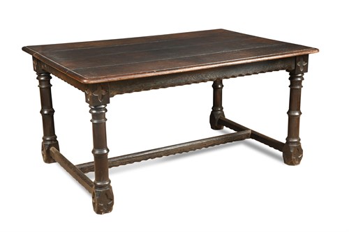 Lot 675 - An oak refectory table of traditional style,...
