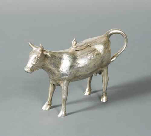 Lot 426 - A continental metalwares naturalistic cow creamer