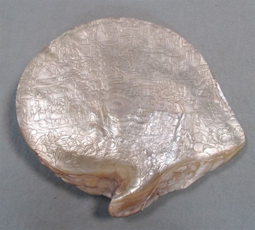 Lot 100 - A Chinese export carved oyster shell, Canton, Qing Dynasty, mid 19th century