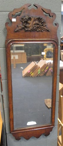 Lot 465 - A Georgian style fret carved walnut frame...