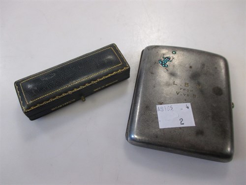 Lot 269 - A pocket cigarette case with a turquoise...