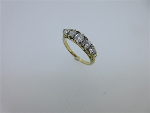 Lot 106 - An Edwardian five stone diamond ring