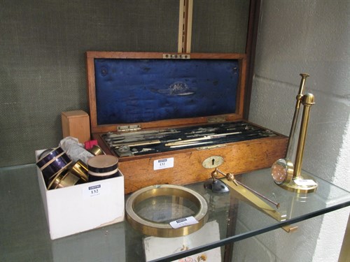 Lot 132 - An oak box containing drawing instruments and...
