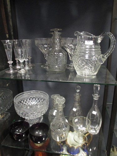 Lot 152 - A cut glass bowl, a jug, various decanters,...