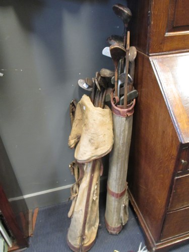 Lot 100 - Two sets of old golf clubs