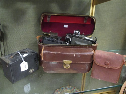 Lot 224 - Two box Brownie cameras, a Graflex Century...