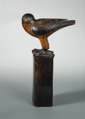Lot 397 - A carved wood model of a falcon
