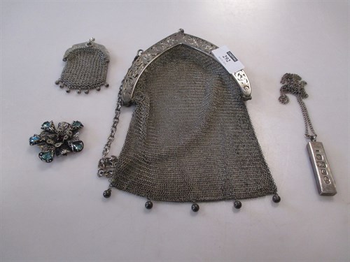 Lot 292 - A silver one once ingot pendant and chain,...