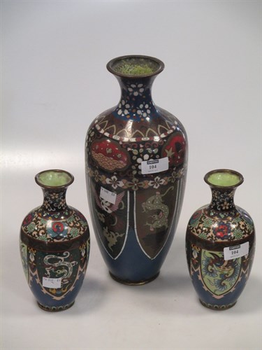 Lot 104 - A Cloisonne vase, two smaller vases, a...