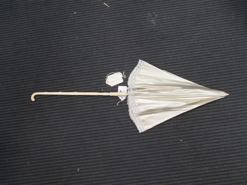 Lot 227 - A French Lady's cream silk parasol