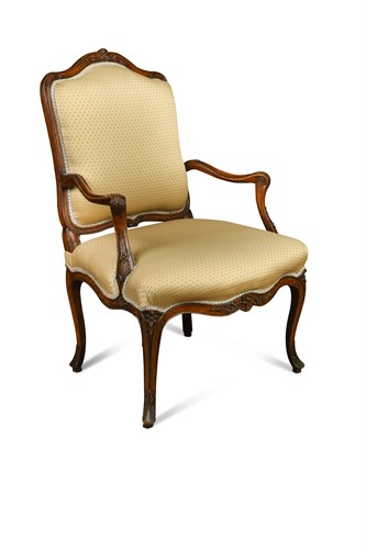 Lot 612 - A Louis XV revival walnut open armchair