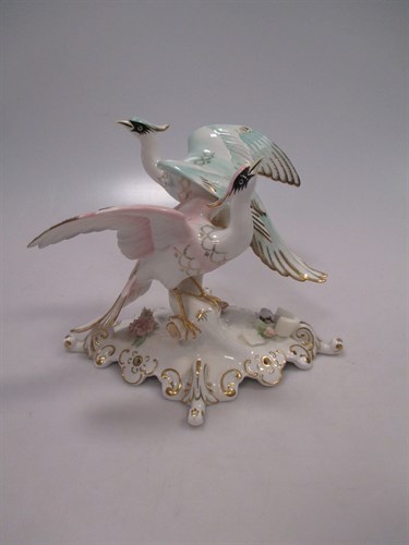 Lot 122 - A Royal Crown Derby figure group, boxed