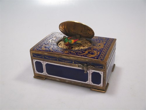 Lot 233 - A Continental clockwork enamel cased singing...
