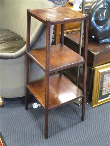 Lot 415 - A George IV mahogany etagere of tapering form...