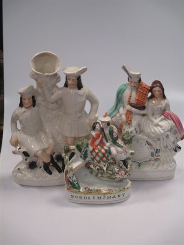 Lot 54 - A large collection of Staffordshire figures...